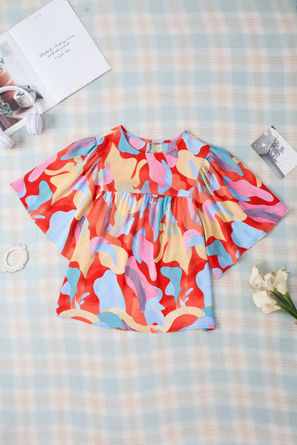 Blusa estampada de media manga con cuello redondo