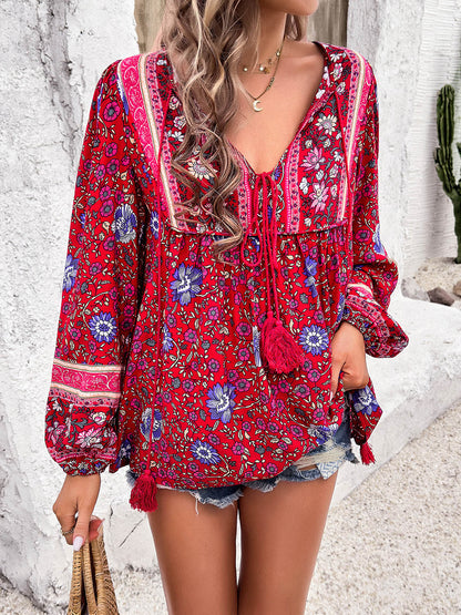 Blusa estampada de manga larga con cuello anudado