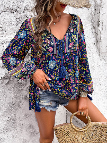 Blusa estampada de manga larga con cuello anudado